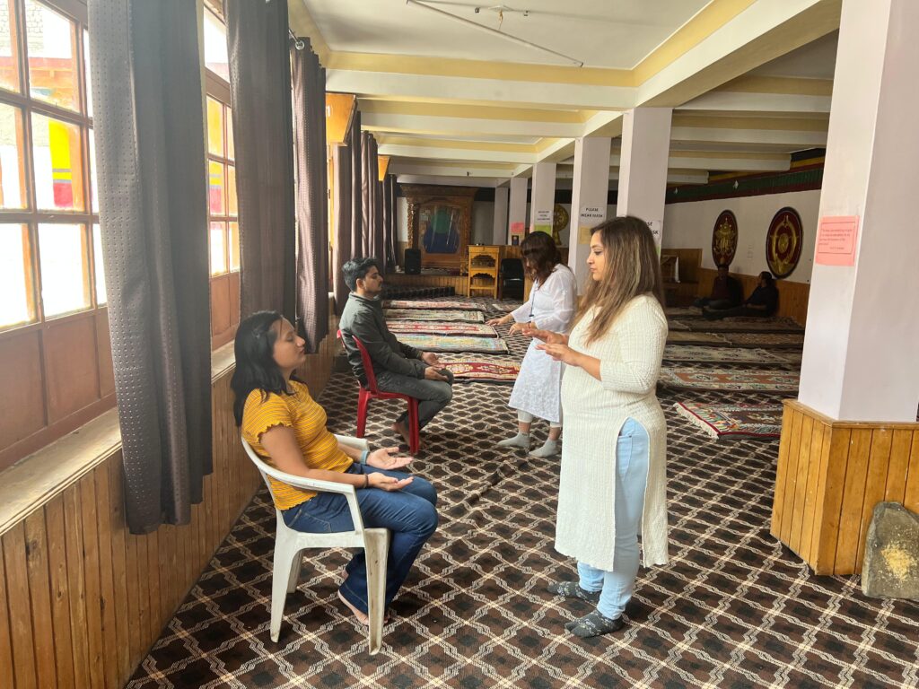 Pranic Healing practitioners conducting healing sessions at Chokhang Vihar Monastery in Leh, Ladakh during a community healing camp.
