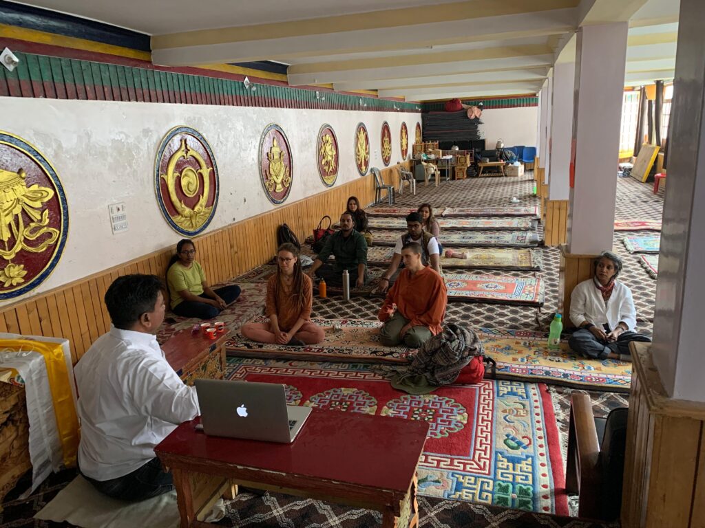 Students attending a Basic Pranic Healing workshop inside Chokhang Vihar Monastery in Leh, Ladakh.
